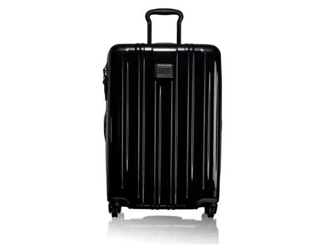 Tumi的登機箱，是旅行中的精致藝術品